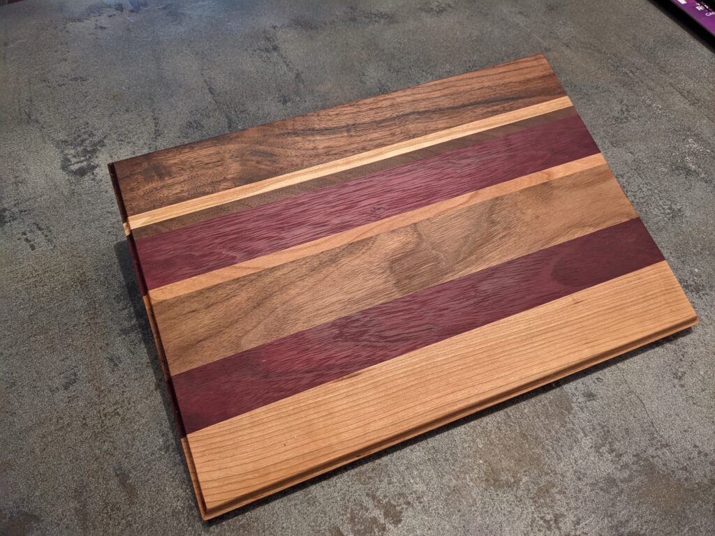 Walnut, oak, maple, purple teak cutting board